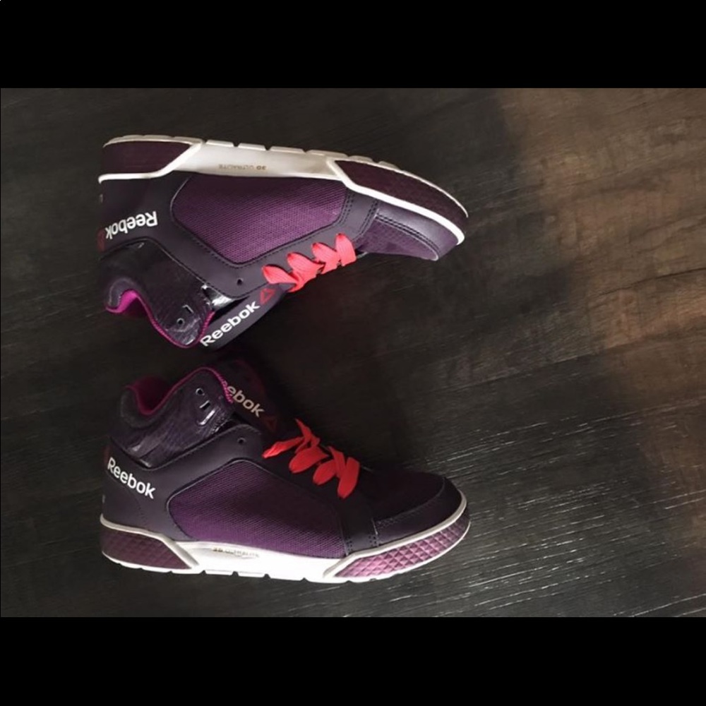 Two pairs of Reebok high top dance sneakers